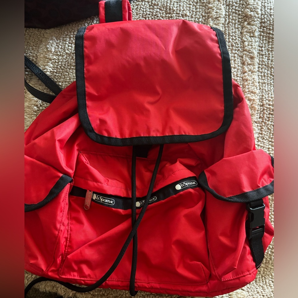 Lesportsac Red Nylon Backpack with Black Trim and Front Pockets